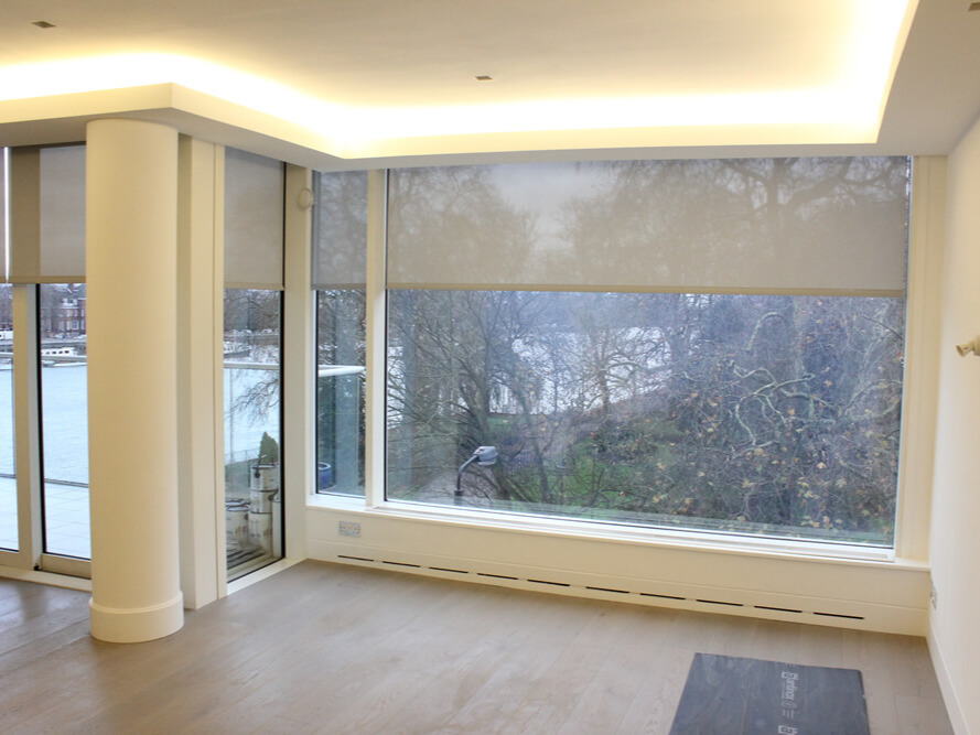 Sleek electric blinds installed in a smart home setting