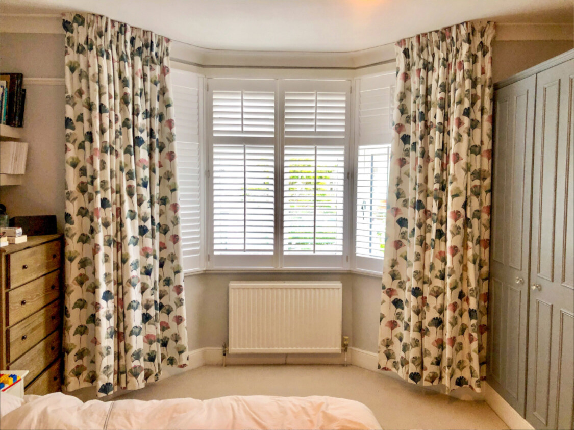 Beautiful interior curtains in a well-lit dining room